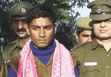 The accused, Harish Singh Rawat, in police custody in the Capital on Sunday.