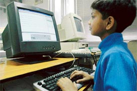 Saurabh demonstrates his skill on the computer keyboard in The Tribune office