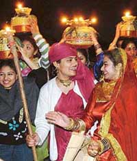 Students of Panjab University take out Jago on the eve of Jhankar-2005 from Student Centre in Chandigarh on Monday.