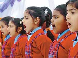 Students of Ankur School, PU, sing at the foundation stone laying function of the school building on Tuesday.