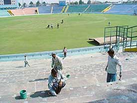 The Punjab Cricket Association stadium in Phase IX, Mohali, being spruced up on Tuesday for a Test match between India and Pakistan to be held from March 8. 