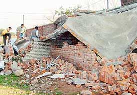 An illegal structure that was razed by the Estate Office in Darua village (near railway station) in Chandigarh on Tuesday. 