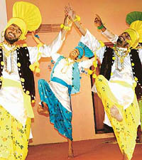 Students present bhangra during Jhankar-2005 at Panjab University on Wednesday.
