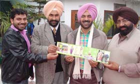 Singer Pammi Bai along with poet Gurbhajan Gill at the release of the latest cassette of his songs in Ludhiana