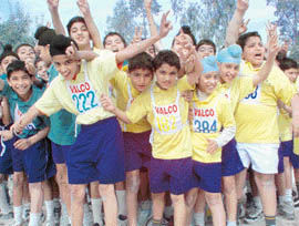 Children of Yadavindra Public School, Mohali, cheer competitors of the 25th athletics meet of the school on Thursday.