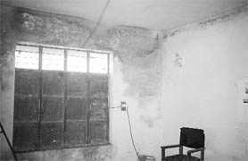 Bullet marks are visible on the walls of Sarv Shiksha Abhiyan Middle School.