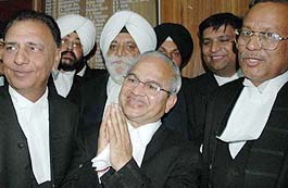 Mr Justice G.S. Singhvi thanks the lawyers of the Punjab and Haryana High Court for their love and affection at the farewell party organised in Chandigarh on Friday. Others seen in the picture are Mr Justice V.K. Bali (extreme left), Mr Justice H.S. Bedi and Mr Justice V.M. Jain.