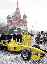 Jordan's Formula One drivers Narain Karthikeyan and Tiago Monteiro present their new racing car at the Red Square in Moscow