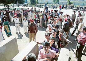 Cricket lovers queue up outside the PCA Stadium to buy tickets for the March 8 Indo-Pak Test match in Mohali