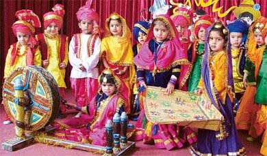Students of Love Dale School present a traditional dance on Friday