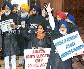 Akali Dal (Badal) and BJP MPs demonstrate against the Punjab Government on the issue of violence in the Ajnala byelection in Parliament on Saturday. 
