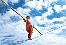 Three-year-old, Aarti, performs a balancing act