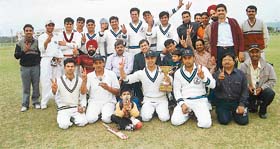 The winning team of HFCL XI, poses with the trophy of the Punjab Telecom Operators Friendship Cup Cricket Tournament