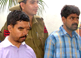 The two accused, Mohammad Hussain Ali and Naushad, in police custody in the Capital on Monday