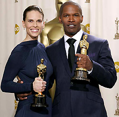 Actress Hilary Swank won the Academy Award for best actress for her role in Million Dollar Baby and Jamie Foxx won the Academy Award for best actor for his role in Ray