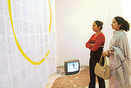 Visitors having a look at an exhibition at Alliance Francaise, Sector 36, Chandigarh, on Tuesday.