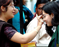 A schoolteacher blessing a student on the first day of the Board examinations in the Capital on Tuesday
