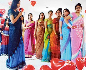 Students take part in a contest held during a farewell party organised at Guru Nanak Girls College, Ludhiana on Tuesday