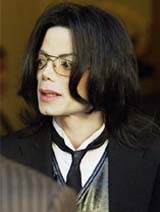 Michael Jackson leaves the courthouse after the opening day of his child molestation trial at Santa Barbara County