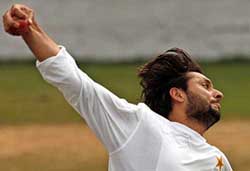Pakistani cricketer Shahid Afridi bowls during a practice session in Dharamsala on Wednesday. 