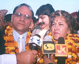 Congress-backed Independent candidate, Mr Bansi Lal, and Mrs Rani Beloria of Congress after filing their papers for the posts of Mayor and Deputy Mayor of the Jammu Municipal Corporation on Thursday