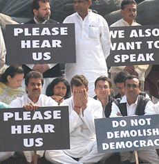 Rahul Gandhi, with other young parliamentarians, sits in dharna against the adjournment of Parliament in New Delhi on Thursday. 