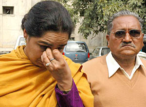 Jyoti, widow of Sanjeev Kumar, who was allegedly tortured to death by the CIA staff of the Chandigarh Police, sobs in the General Hospital-16, Chandigarh, on Friday.