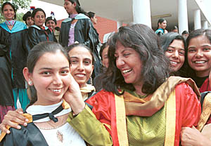 Ms Kanchan Chaudhary Bhattacharya, Director General Police, Uttaranchal, congratulates students at the annual convocation of Government College for Girls, Sector 11, Chandigarh, on Friday.