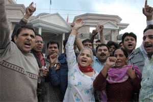 Supporters of Mr Bhajan Lal protest outside his residence at Sector 8, Panchkula, against Hoodas appointment on Friday. 