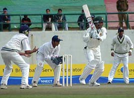 Pakistan all-rounder Abdul Razzaq plays a shot on the second day of the match against Board Presidents XI in Dharamsala on Friday.