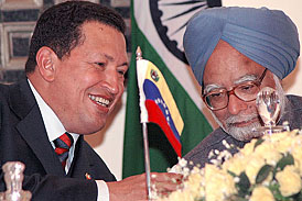 Venezuelan President Hugo Chavez speaks with Prime Minister Manmohan Singh after delegation-level talks at Hyderabad House in New Delhi on Saturday.