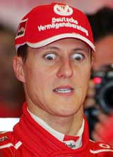 Germanys Michael Schumacher reacts as he watches his rivals complete the first Formula One qualifying session at Melbournes Albert Park circuit on Saturday