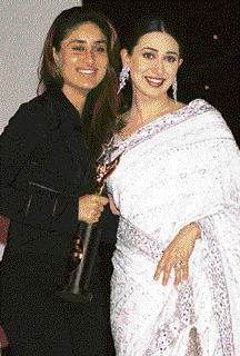 Kareena receives an award from Karisma