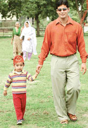Shakeel, a Sanjay Dutt fan from Pakistan, with his little Indian host in Phase 3B2, Mohali, on Saturday. 