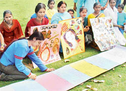  Women from Maloya on a visit to the Rose Garden, Sector 16, Chandigarh on the eve of International Womens Day on Monday. 
