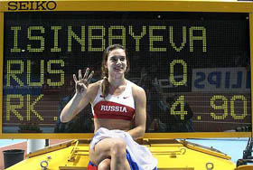 Russias Yelena Isinbayeva gestures after breaking the womens pole vault world record at the European Athletics Championships in Madrid on Sunday