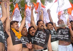 Traders from different states, under the banner of Akhil Bharatiya Udyog Vyapar Mandal, demonstrate against Vat in New Delhi
