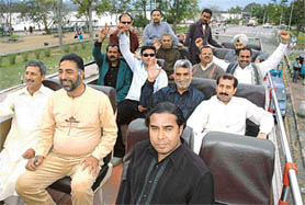 Guests from Pakistan joy ride on Hop-on-Hop-off bus in Chandigarh on Wednesday. 