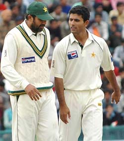 Pakistan captain Inzamam-ul-Haq has a word with Abdul Razzaq during the second days play of the first Test in Mohali