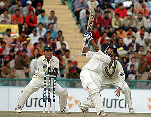 Gautam Gambhir plays a lofted shot during the second days play of the first Test in Mohali on Wednesday. 
