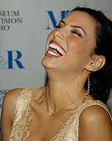 Actress Eva Longoria, who portrays Gabrielle Solis in the dramatic comedy television series "Desperate Housewives," arrives for the 22nd annual William S. Paley Television Festival at the Directors Guild in Los Angeles, California, on Tuesday.