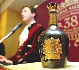 The XIII Duke of Argyll, Torquhil Argyll from Scotland, speaks to the media next to the first bottle in the world of Scotch Whisky Royal Salute 38 Years Old during its unveiling at Walker Hill Hotel in Seoul on Thursday. It goes on sale in the domestic market with the price of 1,700,000 won ($1,700).
