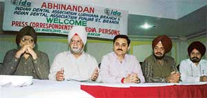 Dr J.S. Judge, Dr Bhagwant Singh, president, Indian Dental Association, and Dr Vivek Saggar at a press conference in Ludhiana on Thursday