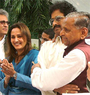 Mr S. Bangarappa, former Chief Minister of Karnataka, is welcomed by Samajwadi Party President and UP Chief Minister Mulayam Singh Yadav after he joined his party as Jaya Prada, MP and film actress, looks on in New Delhi on Thursday.