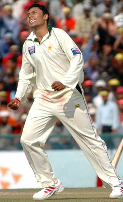 Danish Kaneria exults after snaring Sourav Ganguly during the third days play of the first Test in Mohali on Thursday