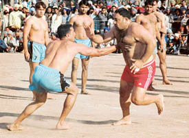 An Indian player on attack during an Indo-Pak kabaddi match organised, in Zirakpur on Friday. 