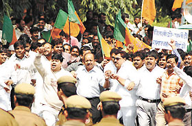 Delhi Pradesh BJP president Dr Harsh Vardhan with the party activists, protesting against the excise policy and shortage of water in the Capital on Friday