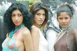 Models pose for photographers