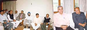 Haryana Minister O.P. Jindal at a meeting of district administration in Bhiwani
