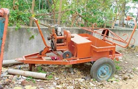 A sewerage cleaning machine lying dumped in a park in Ludhiana